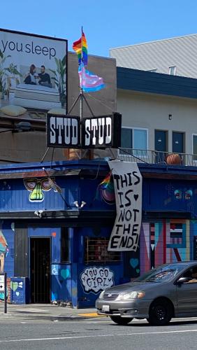 Exterior shot of the stud bar in San Francisco, CA. Image captured in June of 2020 during the COVID pandemic while San Francisco was still shutdown. The exterior of the building is covered in graffiti and murals by various queer artists.