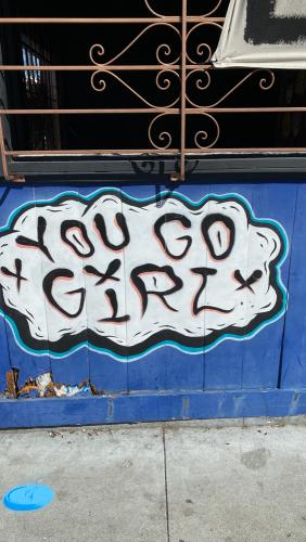 Exterior shot of the stud bar in San Francisco, CA. Image captured in June of 2020 during the COVID pandemic while San Francisco was still shutdown. The exterior of the building is covered in graffiti and murals by various queer artists.